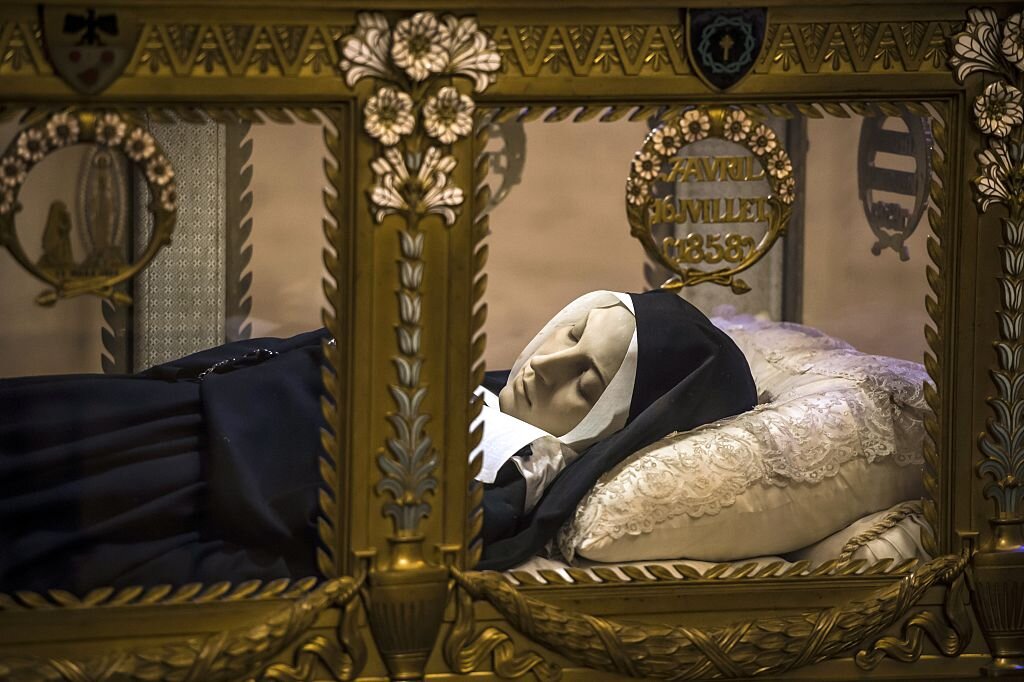 A view of the shrine in the chapel of the Convent of St Gildard of Nevers, where the body of Marie Bernarde "Bernadette" Soubirous, known as St Bernadette, is buried, on February 6, 2015 in Nevers. The Mayor of Nevers, Denis Thuriot, denounced a campaign to transfer the remains of Saint Bernadette to Lourdes. AFP PHOTO / JEAN-PHILIPPE KSIAZEK (Photo credit should read JEAN-PHILIPPE KSIAZEK/AFP via Getty Images).